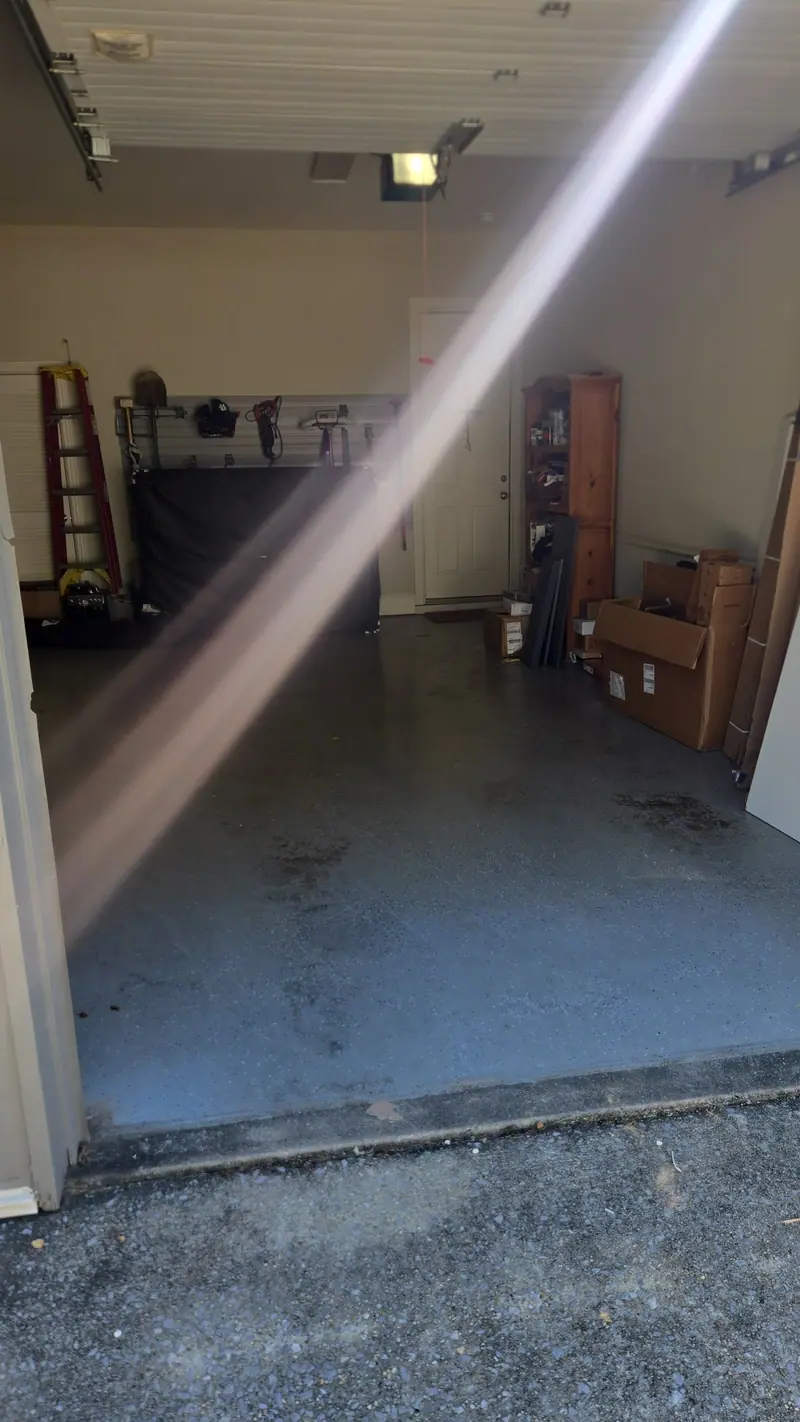 A garage packed wall to wall before cleanout
