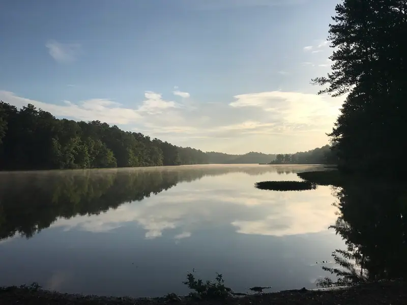 Early-morning mist on a lake at Oak Mountain State Park